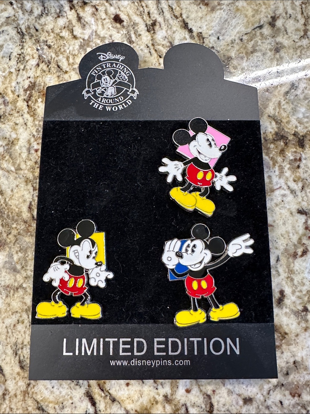 Disney pin trading around the world limited edition pins.